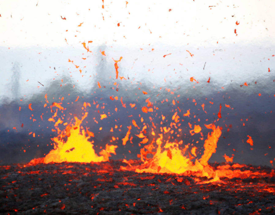 Fissure spitting out fire and brimstone (sulfur)